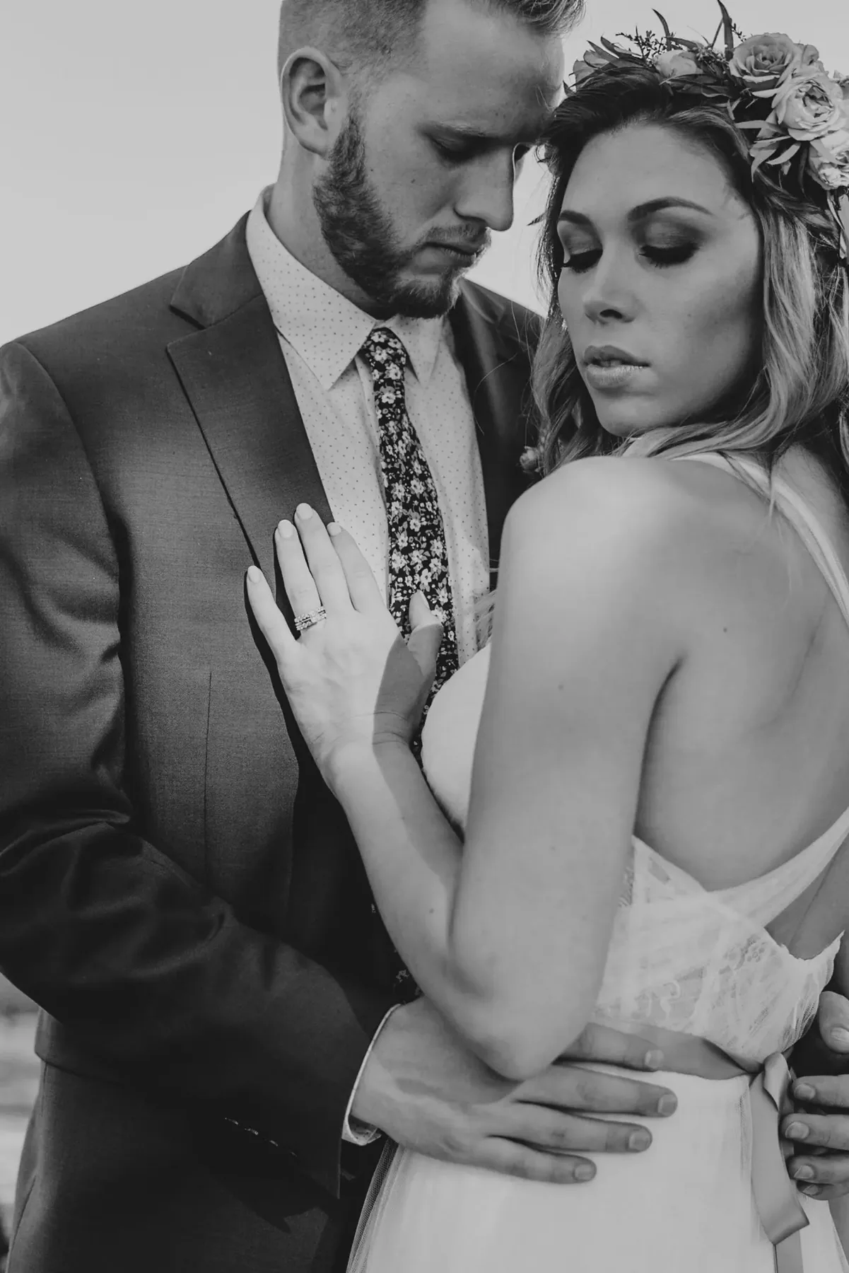 Couple embracing at wedding